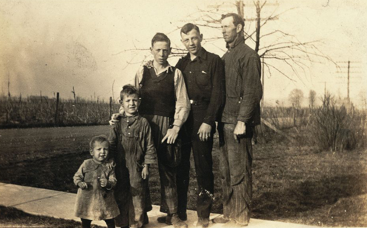Coach with brothers and Dad Joshua