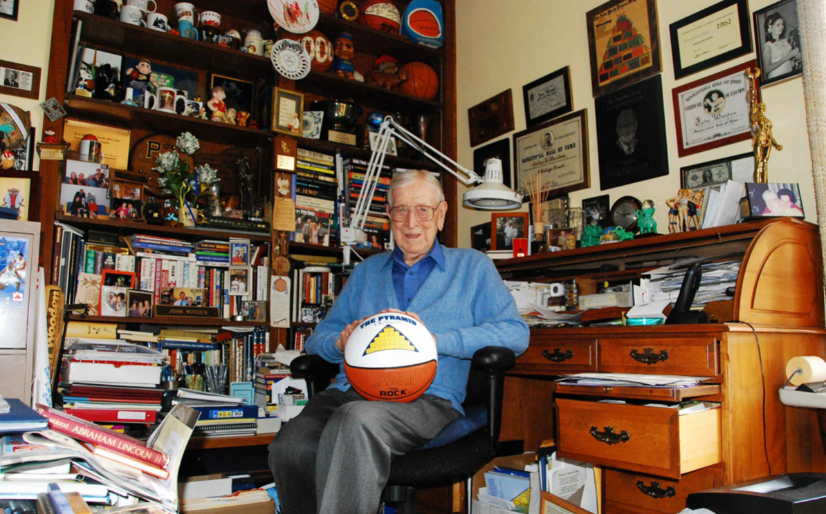 JW in den with basketball in lap